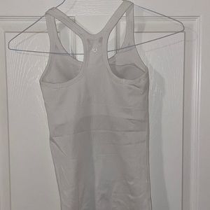 LuluLemon white tank! Love the style but need a size larger.